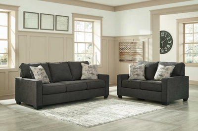 WEEKLY or MONTHLY. Lucena Charcoal Couch and Loveseat