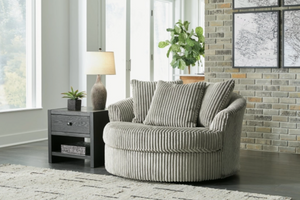 WEEKLY or MONTHLY. Lindyn Foggy Soft Gray Swivel POD Chair